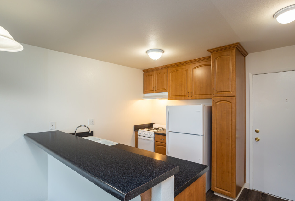 Windward Village Apartments studio kitchen with appliances Windward Village Apartments studio kitchen with appliances